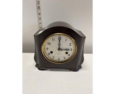 A vintage Bakelite mantle clock by Smiths Enfield with key and pendulum (missing glass), shipping unavailable 