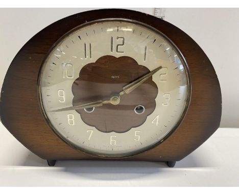 A vintage Smiths mantel clock with key.Shipping unavailable 