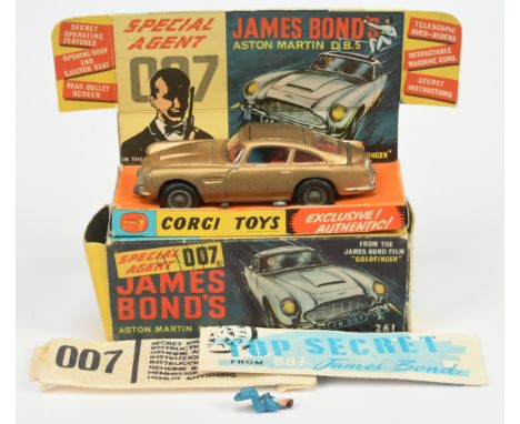 Corgi Toys 261 "James Bond" Aston Martin DB5 From "Goldfinger" - Gold body, red interior wit "James Bond &amp; Bandit" figure