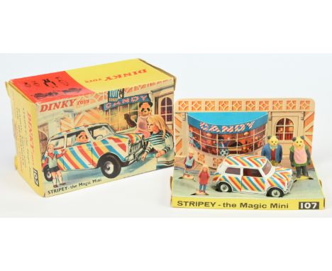 Dinky Toys 107 "Stripey" The Magic Mini - White body with yellow, blue and red stripes, silver trim and spun hubs - Good Plus