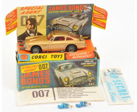 Corgi Toys 261 "James Bond" Aston Martin DB5 From "Goldfinger" - Gold body, red interior with "James Bond" figure, silver tri