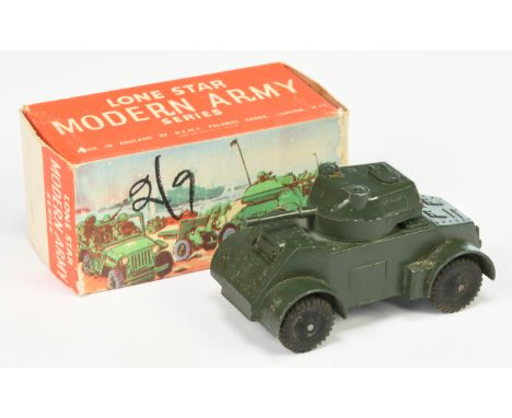 Lone Star Military Armoured car - Green with black solid wheels with tow hook - Good Plus in a Good red and white carded pict