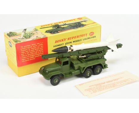 Dinky Toys Military 665 Honest John Missile Launcher - Green including plastic hubs and rear platform with white and black mi