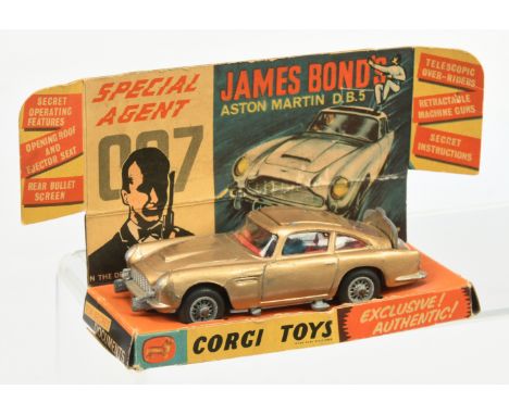 Corgi Toys 261 "James Bond" Aston Martin DB5 - Gold body, red interior with "James Bond &amp; Bandit" Figures, wire wheels - 