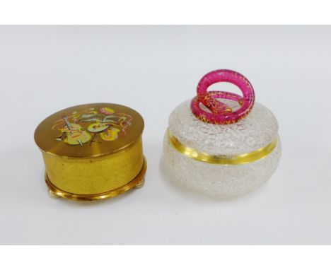 Vintage musical compact box and a frosted glass jar and cover with ruby glass snake handle, (2) 