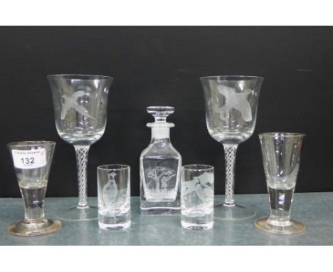 Small etched glass decanter and stoppers with a hunting figure, two shot glasses with game birds, together with two etched gl