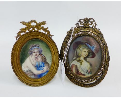 Oval portrait miniature, signed H. Dennis, in a brass frame with an easel strut back, 13.5cm long, together with another, sig