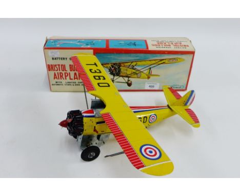 Japanese battery operated tin plate Bristol Bulldog Aircraft, with flashing engine and automatic action, boxed 