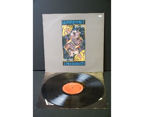 Vinyl - Warrant Dog Eat Dog on Columbia COL 472033 1. Sleeve is at least Vg but has sings of corner and seam wear, along with