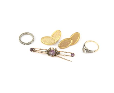 Antique amethyst and seed pearl bar brooch, a round cut amethyst millegrain set to the centre, with seed pearls set either si