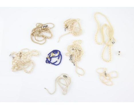 Collection of pearls, three cultured pearl necklaces, with white gold clasps, three set with diamonds, a lapis lazuli and pea
