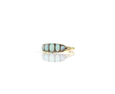 Antique five stone opal ring, five graduated oval cabochon cut opals, with small diamonds chips between, mounted in 18 ct gol