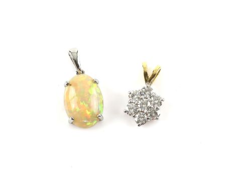 Moissanite floral design pendant, mounted in 18 ct white gold, with a yellow gold bale, and an oval cabochon cut opal pendant