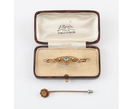 Bar brooch and a stick pin, bar brooch with a millegrain set blue stone and four seed pearls, in stamped 9 ct gold, and a sti