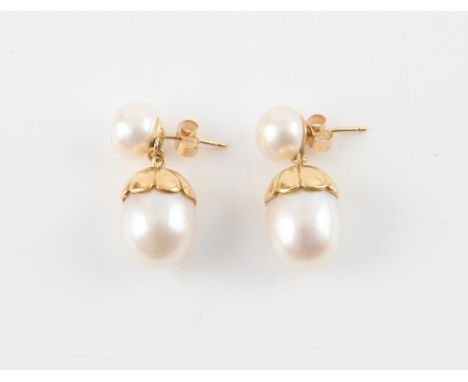 Pearl drop earrings, 9 mm bouton pearls, suspending a 11.8x16mm oval pearl, in stamped 18 ct yellow gold, with post and butte