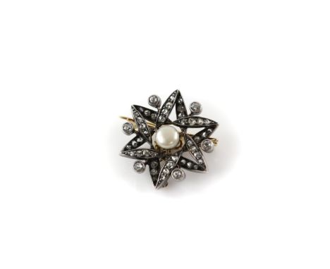 Victorian star brooch, set with a central 5.71mm pearl, and surrounded by old cut and rose cut diamonds, set in silver and go
