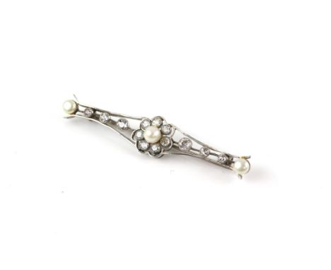 Edwardian pearl and diamond bar brooch, set with a central pearl and old cut diamond cluster, with three old cut diamonds eac