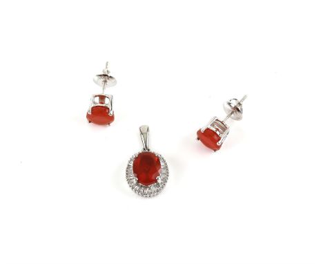 Fire opal and diamond set, the pendant is set with a central faceted fire opal, estimated weight 1.32 carats, with a tapered 