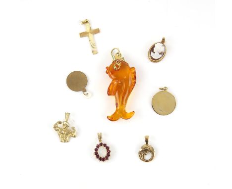 Selection of pendants including a fish pendant, an opal and garnet cluster, a cameo pendant, a St. Christopher, a plain disc 