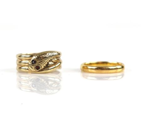 Two gold rings, including, a snake design ring, with garnet set eyes, in 9 ct yellow gold, hallmarked Birmingham 1989, ring s