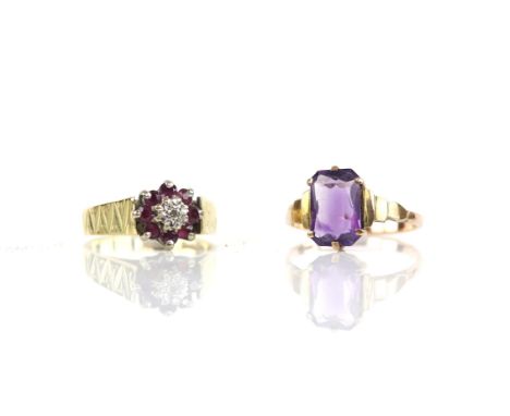 Two rings, a ruby and diamond cluster ring mounted on a textured shank in 18 ct yellow gold, ring size O, together with an am