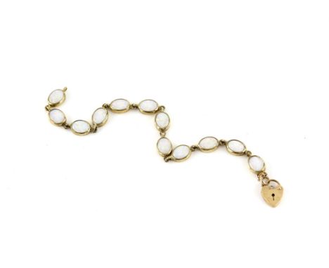 Opal line bracelet, featuring twelve oval cabochon cut opals, in a rubover setting, mounted in 9 ct yellow gold, with heart p