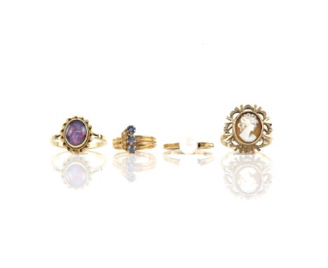 Collection of four gold rings, including a three stone sapphire and seed pearl ring in tested 18 ct yellow gold, size H, a ca