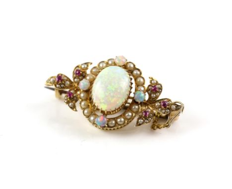 Edwardian opal, ruby and pearl brooch, central oval cabochon cut opal, estimated weight 3.04 carats, surrounded by four round