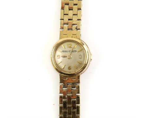 Ladies Jaeger-LeCoultre wristwatch, circular gold tone dial with baton hour markers and Arabic numerals, on an integral brick