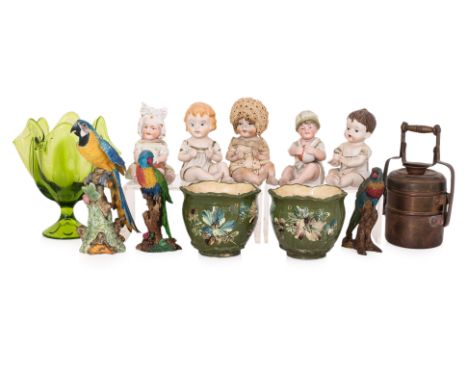 A GROUP OF BISQUE PORCELAIN BABIES AND OTHER OBJECTS
Including: a pair of small pottery jardinieres; a ceramic parrot and two