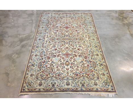 A NAIN WOOL RUG (278 x 160cm)
Hand knotted wool pile, trailing foliate design on a cream field
Ownership Statement: This item