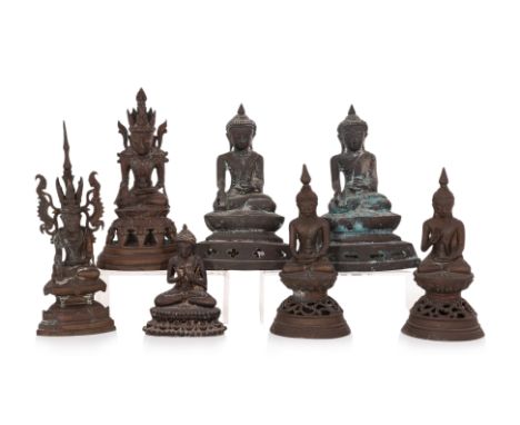 A GROUP OF BURMESE BRONZE BUDDHA STATUES
Comprising of two of a similar type seated holding attribute, two others of a simila