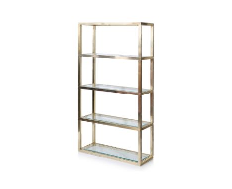 A BRASS AND GLASS OPEN-FACED BOOKSHELF BY PIERRE VANDEL
France, fluted brass alloy frame with five bevelled glass shelves, 'P