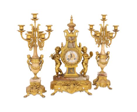 A LARGE IMPERIAL HERMLE MANTEL CLOCK AND GARNITURE SET
Italian case by Imperial, German mechanical chiming movement by Franz 