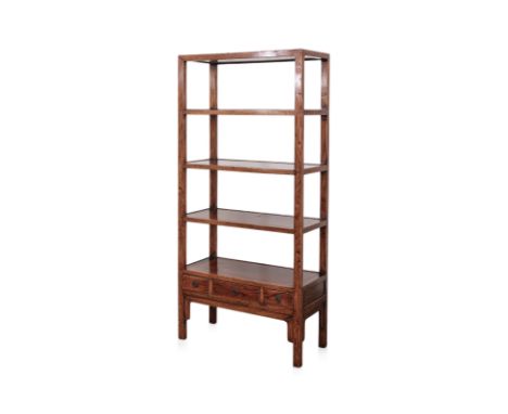 AN ELM BOOK SHELF
Chinese, has four shelves, each with single rectangular panel and raised rear edge, the lower section has t