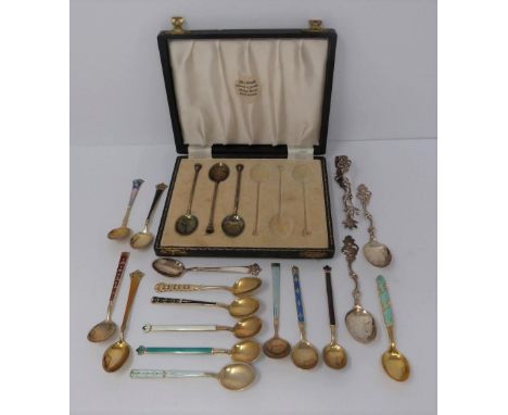 A collection of silver and  enamel spoons, Norwegian and English, three spoons in a case, Birmingham each one with different 