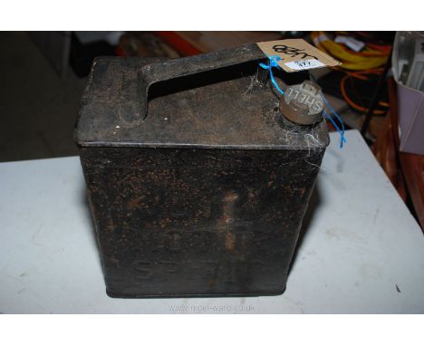 A BP petrol can with a shell brass cap .