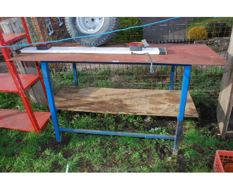 Metal workshop bench 25'' deep x 60'' wide x 33'' high.