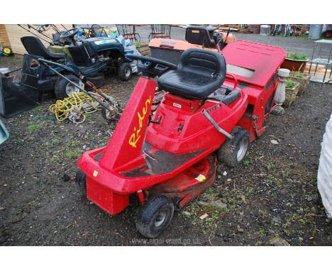 A Countax 'Rider' ride-on mower with grass collector box 11.5 HP electric start Briggs &amp; Stratton engine.