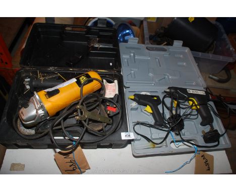 A JCB 4 1/2" angle grinder, (needs new brushes), and two glue guns, (working on arrival).