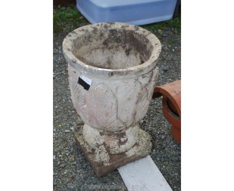 A lily effect tall planter 13" diameter x 19 1/2" high.