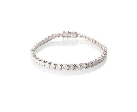 A DIAMOND BRACELET set with forty six round brilliant-cut diamonds weighing approximately 7,5 carats, colour appears to be J-