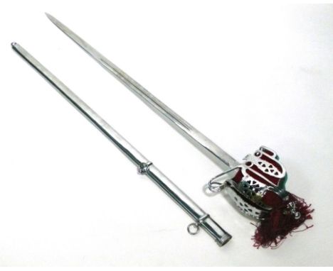 A Scottish Basket Hilt sword, 20th Century
79cm straight double edged, double fullered blade with acid etched decoration, chr