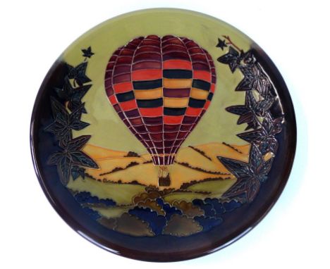 A modern Moorcroft limited edition circular charger
Decorated in the Autumn Balloon pattern, 'Specially commissioned by R & R