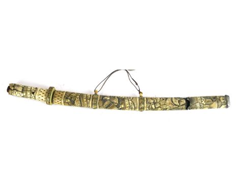 A Japanese Wakizashi, Mejii period 
48cm curved single edged blade, Tang unsigned, with copper habaki, with carved bone tsuba