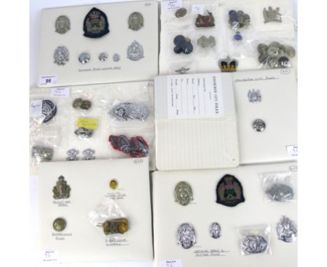 A collection of Scottish Police National badges
To include two white medal badges, embroidered senior officers cap badge, chr