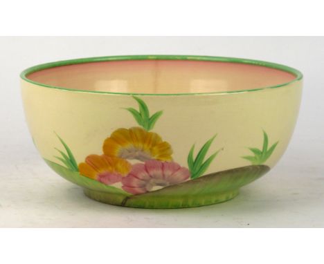 A Clarice Cliff Royal Staffordshire pottery bowl
Decorated in the Aurea pattern, printed factory marks to base, diameter 19.5