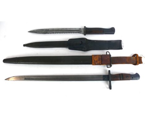 An Imperial German WWI S84/98 Saw-back bayonet
The 25cm saw-back single edged single fullered blade stamped 'Deutsche Maschin