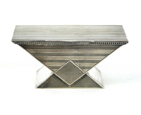 An Art Deco hallmarked silver dressing table box
Of angular form, having engine turned decoration to cover, enclosing gilt in