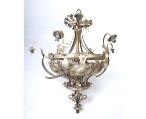 A W.A.S. Benson six branch Art Nouveau style ceiling light, 20th Century
The upper pediment with scrolling ribbon type design